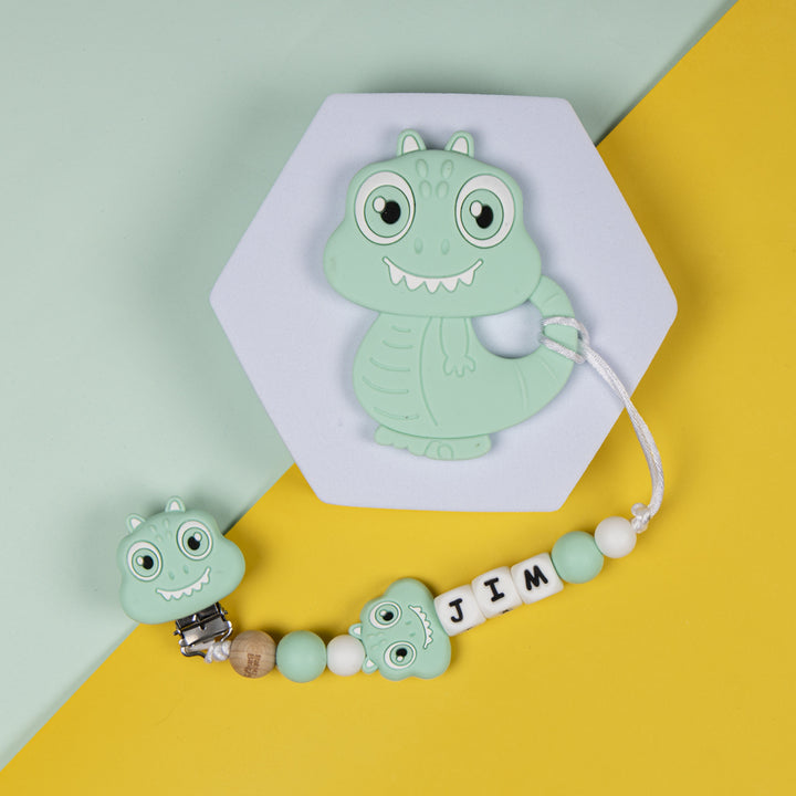 Buy Mint Dinosaur Pacifier Clip Online | Non-Toxic & Durable | Order Now